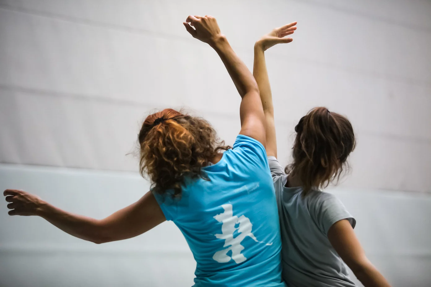 Participants engaging in dance movement therapy for mind-body wellness
